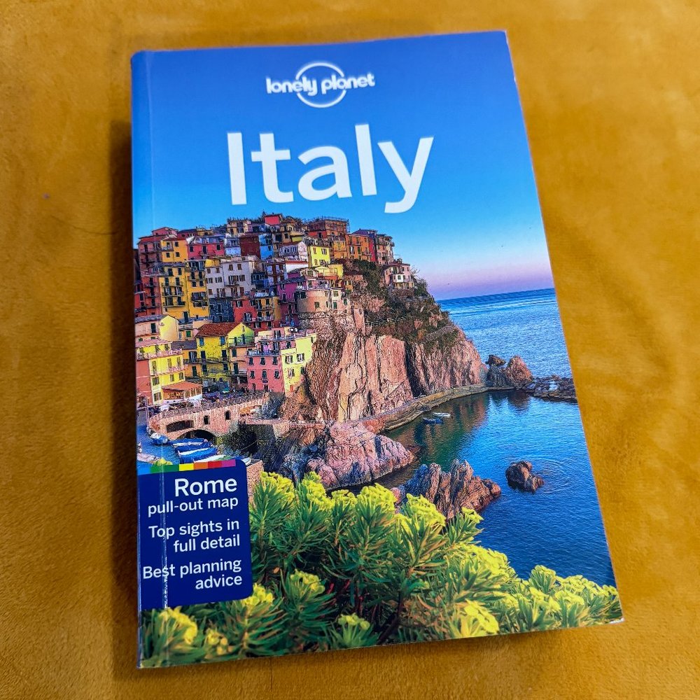 “Italy” by Lonely Planet - paperback travel guide